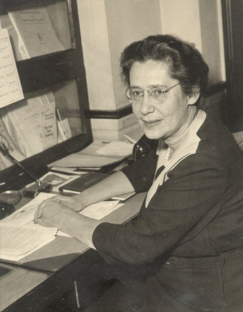 Mary Dyckman at her desk