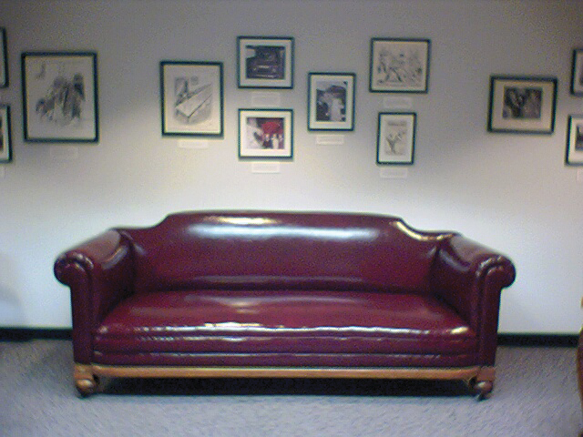 couch and framed documents in seminar room 7
