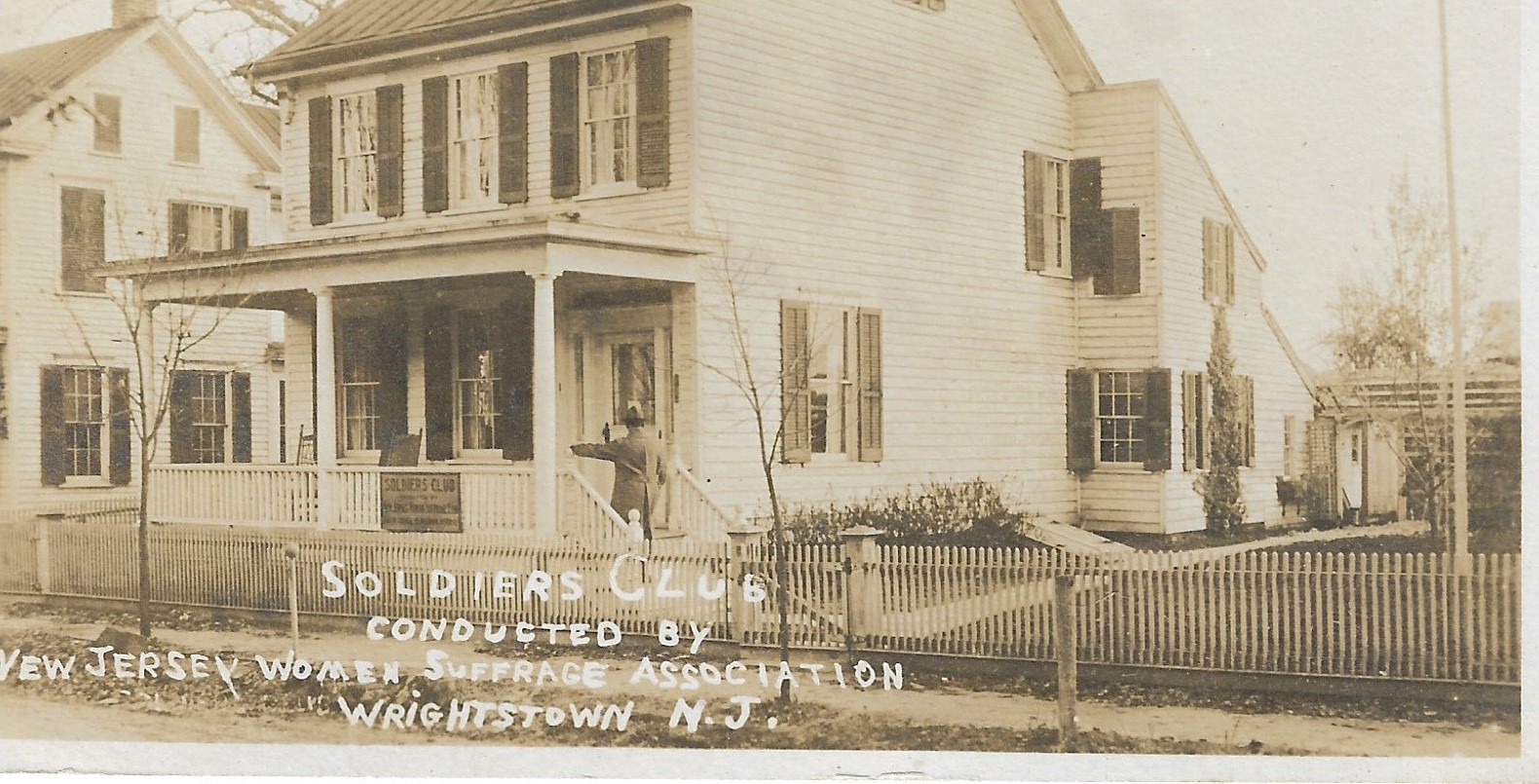 sepia-tone photo of the Soldiers Club in Wrightstown, NJ. appears to be a typical 4-square house with a very large 2 story extension off the back