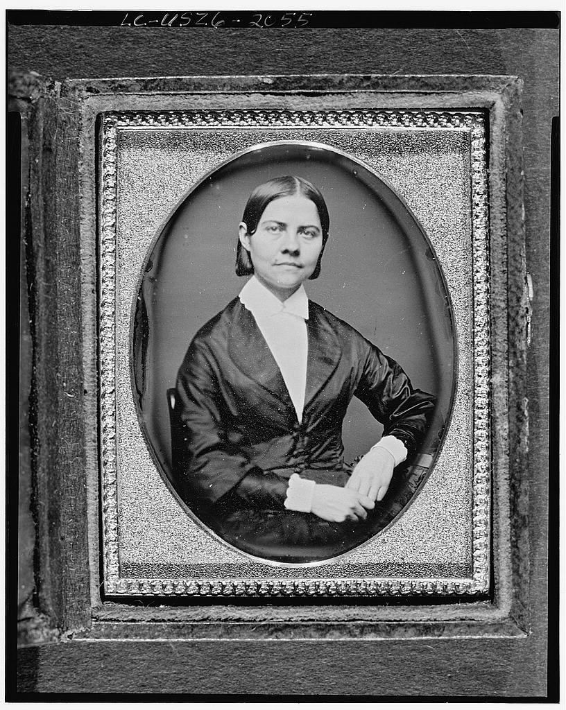 Lucy Stone, half-length portrait of a woman, seated, facing front